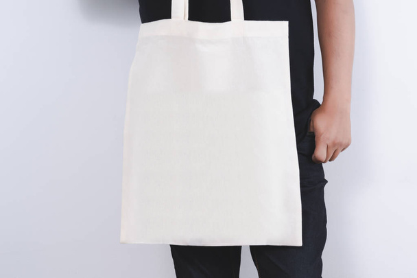 man with cotton bag  shopping bags eco mockup - Foto, Imagem