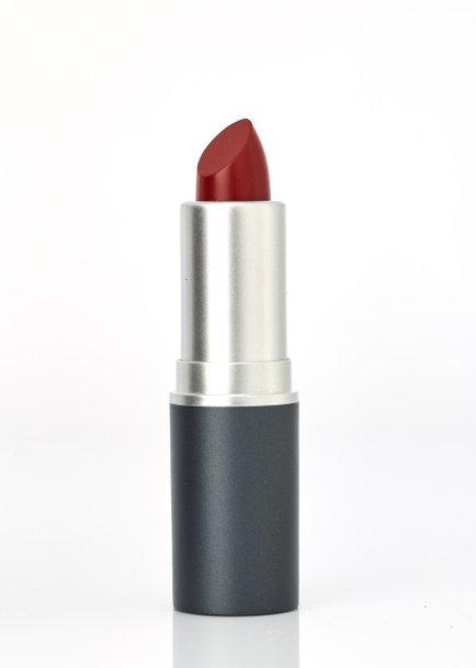 single tube of red lipstick on white - Foto, afbeelding