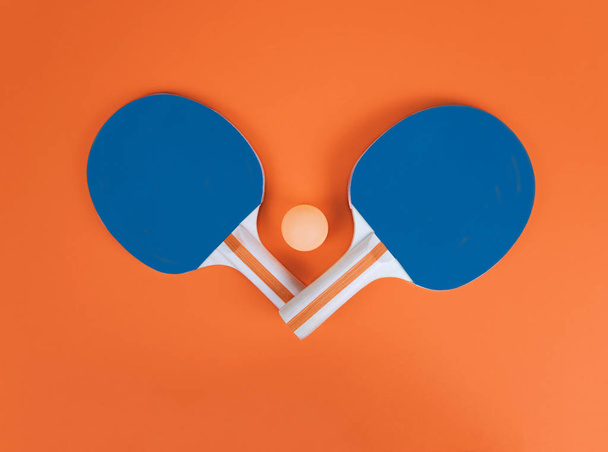 Table tennis or ping pong rackets and ball. - Foto, afbeelding