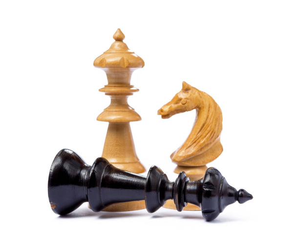 Old chess pieces isolated on white background - Foto, afbeelding