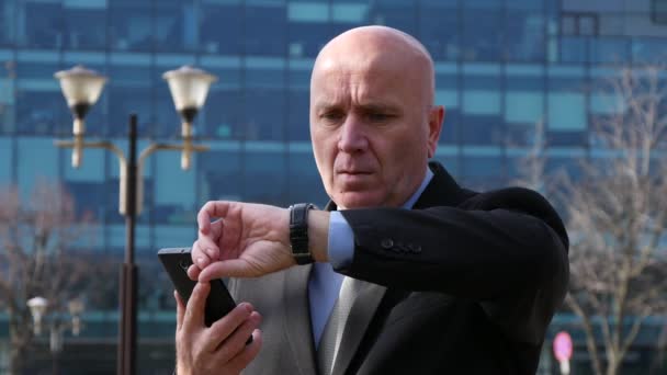 Businessman Checking Hand Watch Looking Concerned Late to Business Meeting. - Video, Çekim