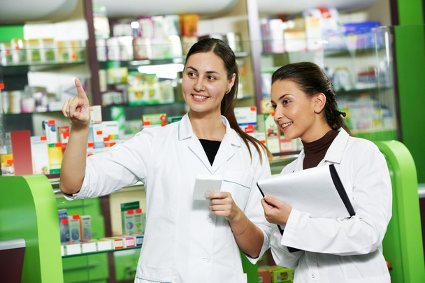 Pharmacy chemist women in drugstore - Fotografie, Obrázek