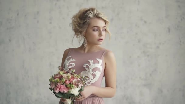 glamorous and sensual girl. portrait of a delightful young girl in an evening dress. blonde girl with holiday makeup and hairstyle. - Footage, Video