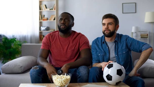 Guys frustrated by defeat of favourite team, watching football match on tv - Fotoğraf, Görsel