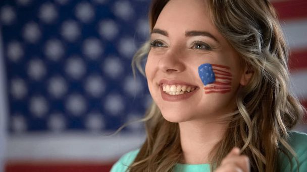 Happy American woman supporting political candidate, celebrating victory closeup - Foto, Imagem
