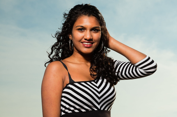Pretty indian girl with long hair on the beach in summer. - Φωτογραφία, εικόνα