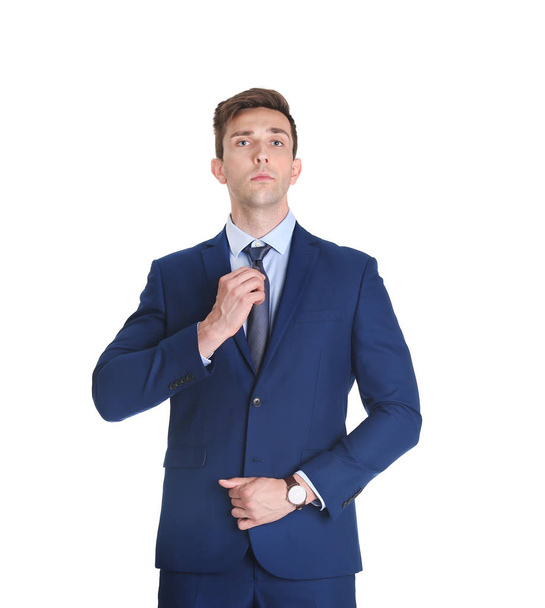 Handsome young man in suit on white background - Fotografie, Obrázek