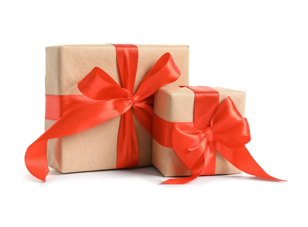 Beautifully wrapped gift boxes on white background - Foto, Imagen
