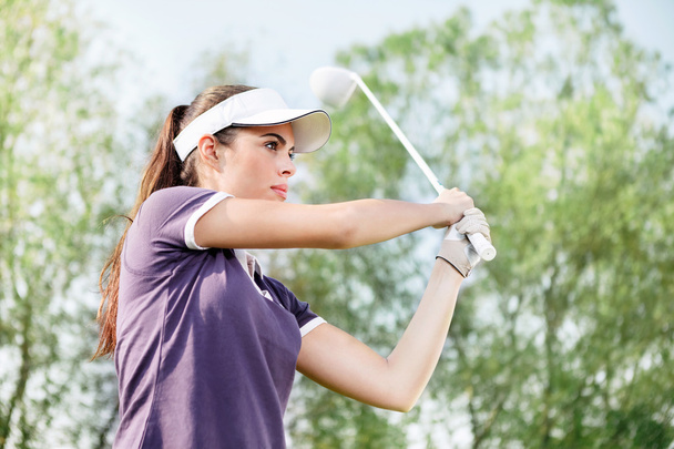 Woman playing golf - Foto, imagen