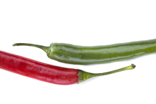 isolated Red and green chili peppers vertical - Foto, Imagem