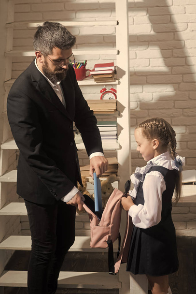 Its time to go to school. Back to school concept. Schoolgirl and dad with happy faces - Fotografie, Obrázek