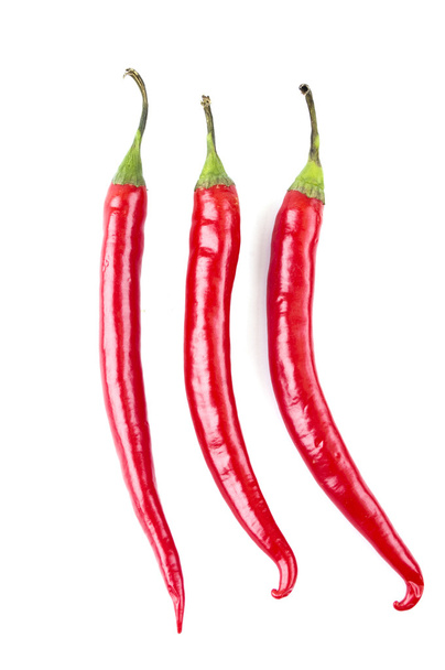 a series of three chili peppers vertical - Foto, Imagem