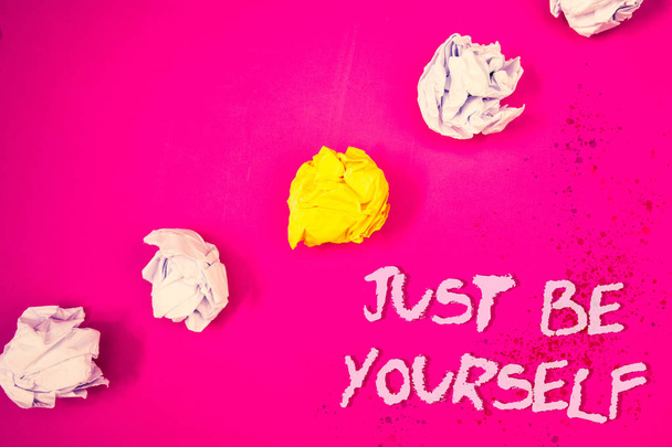Word writing text Just Be Yourself. Business concept for Self Attitude Confidence True Confident Honesty Motivation Words pink background crumbled paper notes yellow white diagonal stress - Foto, afbeelding