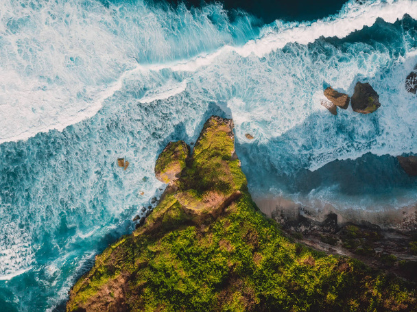 Top view of tropical beach with turquoise sea water and reef, aerial drone shot - Photo, Image