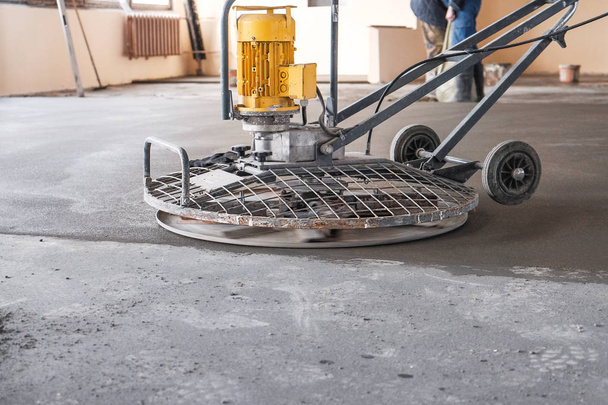 grinding of concrete floor - Fotó, kép