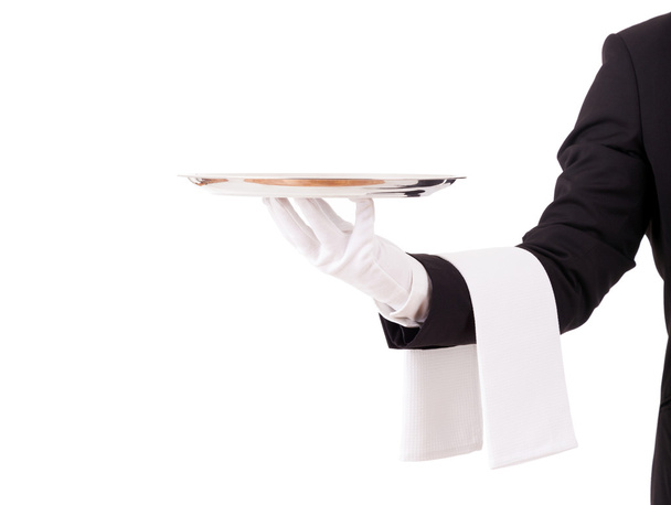 Professional waiter holding an empty dish. Isolated on white bac - Foto, Imagem