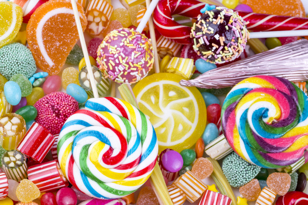 Барвистий десертний фон з цукерок
 - Фото, зображення