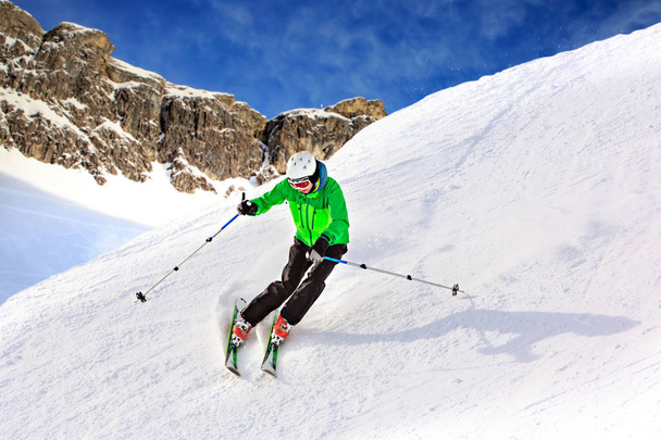 A ski driver on the piste in Alps by Lech, Austria. - Photo, Image
