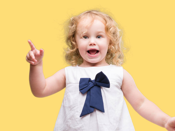 Beautiful blonde toddler gesturing - Foto, imagen