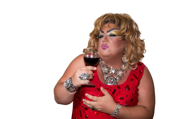 Funny travesty actor. Drag queen and red wine. Feelings and emotions - Photo, Image