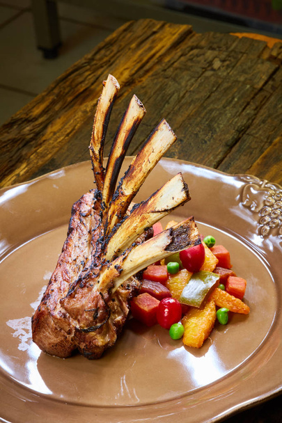 Lamb rack with limoncello glaze served on a plate - Foto, imagen