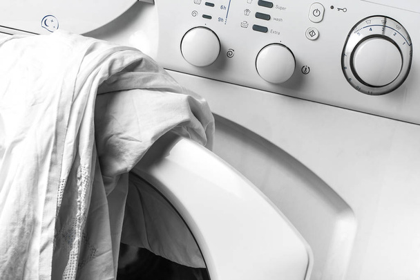 Πλυντήριο ρούχων λευκό κινηματογράφηση σε πρώτο πλάνο - Φωτογραφία, εικόνα