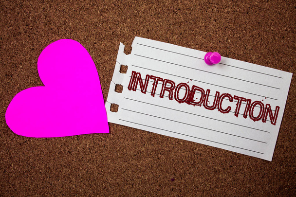 Handwriting text Introduction. Concept meaning First part of a document Formal presentation to an audience Piece notebook paper grunge ideas pink heart cork background love lovely - Foto, Bild