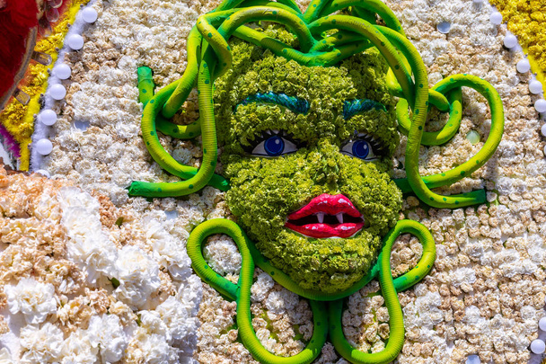 Grotesque mask of an Italian flower festival - Photo, Image