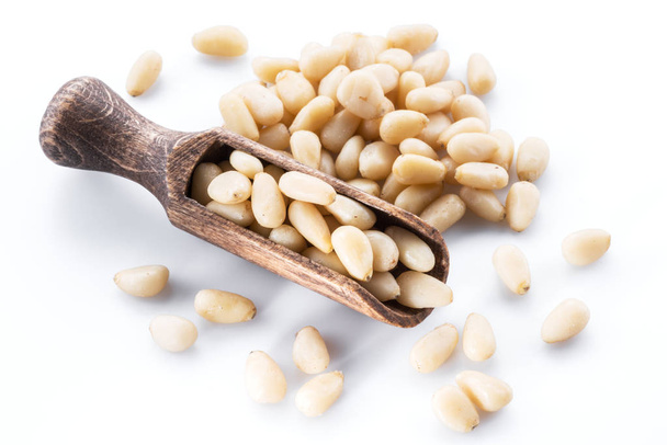 Pine nuts on the white background. Organic food. - 写真・画像