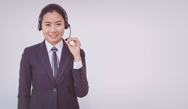 Business woman in headsets - Photo, Image
