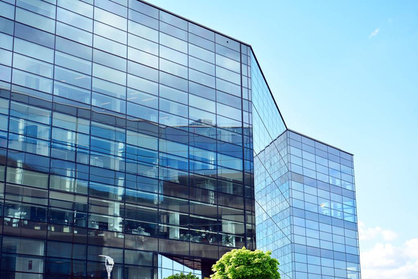 Urban abstract background, detail of modern glass facade, office business building - Fotó, kép