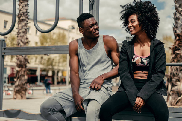 Young happy black couple outdoors - 写真・画像