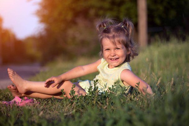 little smiling girl at the garden - Fotó, kép