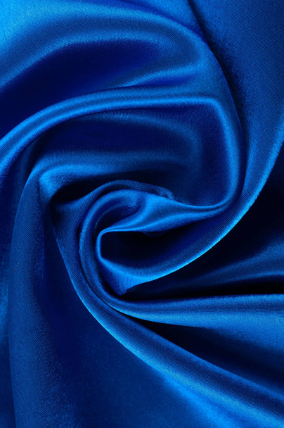 Αφηρημένη πολυτελή μεταξωτά φόντο, κομμάτι του υφάσματος, βαθύ μπλε ύφασμα υφή - Φωτογραφία, εικόνα