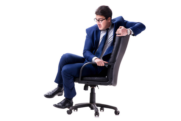 Uomo d'affari seduto sulla sedia da ufficio isolato su bianco
 - Foto, immagini
