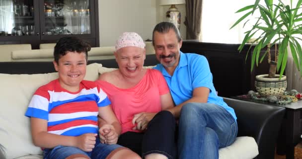 Portrait of a happy sick woman fight with cancer with family's help - Materiał filmowy, wideo