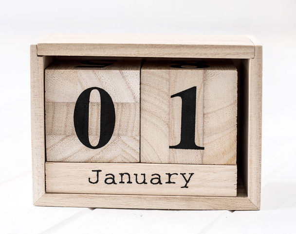 Wooden calendar that shows first of january - Foto, Imagem