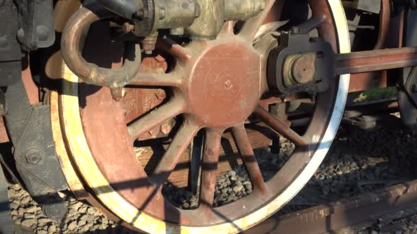 Detail of wheel on a steam locomotive placed in Carroponte area as a monument to remember the old factories in Sesto San Giovanni - Footage, Video