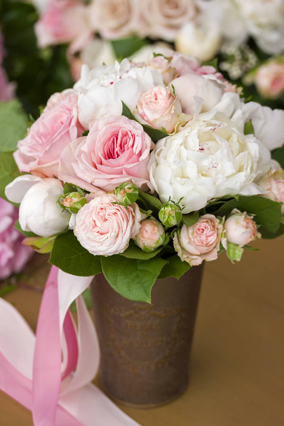 Brides bouquet with peony roses and ribbon - Foto, Imagen
