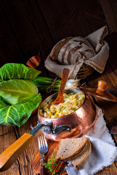 young and fresh cabbage cooked with bacon cubes - Φωτογραφία, εικόνα