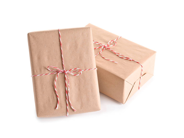 Beautifully wrapped gift boxes on white background - Foto, imagen