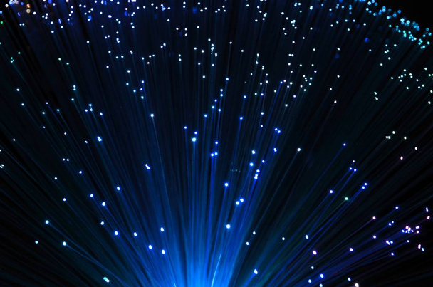 Abstract Internet technology fiber optic blue background - Fotoğraf, Görsel