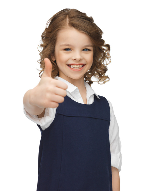 Pre-teen girl showing thumbs up - Photo, Image