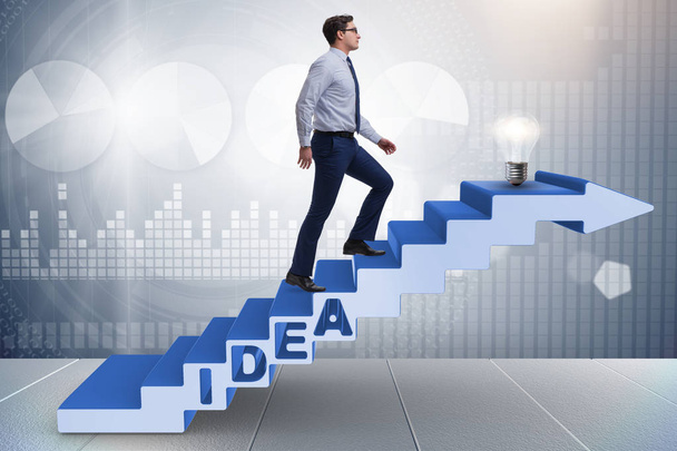 Концепция идеи с предпринимателем, поднимающимся по лестнице - Фото, изображение