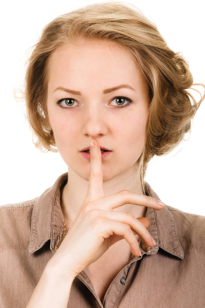 Woman shows sign of silence. portrait - Photo, image