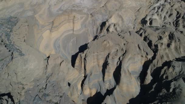 Aerial drone scene of Malacara volcano in Malargue, mendoza, cuyo, Argentina. Camera moving downwards mountain. Touristic volcano in La Payunia National Park. hydromagmatic volcano. Colorful walls. - Séquence, vidéo