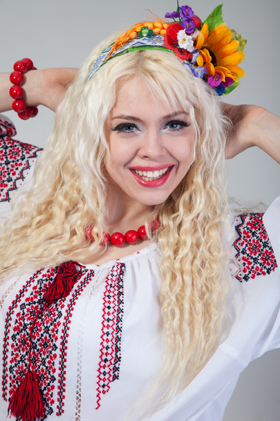 Woman wears Ukrainian national dress - 写真・画像