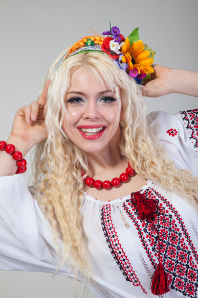 Woman wears Ukrainian national dress - Фото, изображение