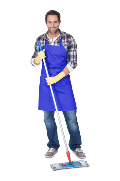 Portrait of a man cleaning floor - Foto, Imagen