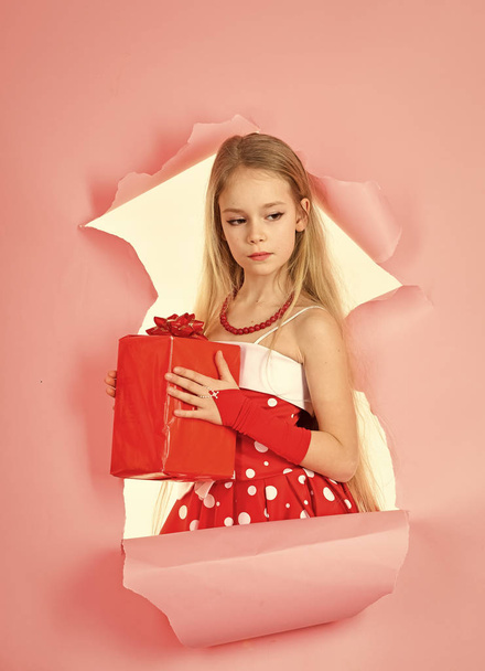 children model. Child girl with present pack, cyber monday. child girl hold gift box, copy space. - Φωτογραφία, εικόνα